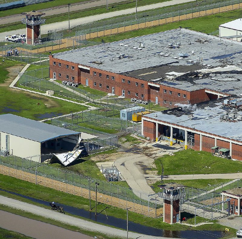 Wind damage is visible Monday at the Arkansas Department of Correction’s Delta Regional Unit in Dermott. The Ouachita River Unit in Malvern also sustained damage from storms that moved through the state Sunday.