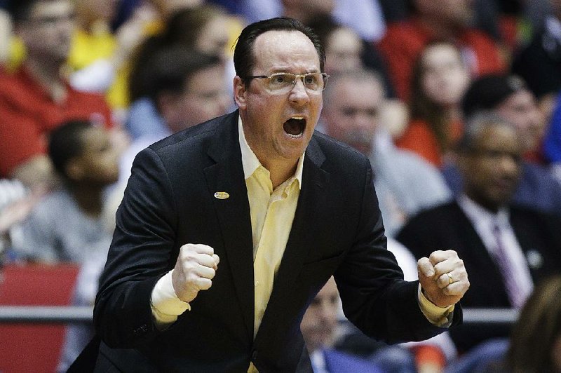 Wichita State Coach Gregg Marshall exhorts his team during the first half of Tuesday night’s game against Vanderbilt.