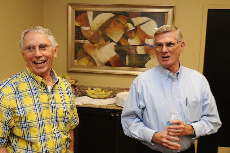 Dr. James Bledsoe, right, is shown in this 2012 file photo with Frank Winscott. 