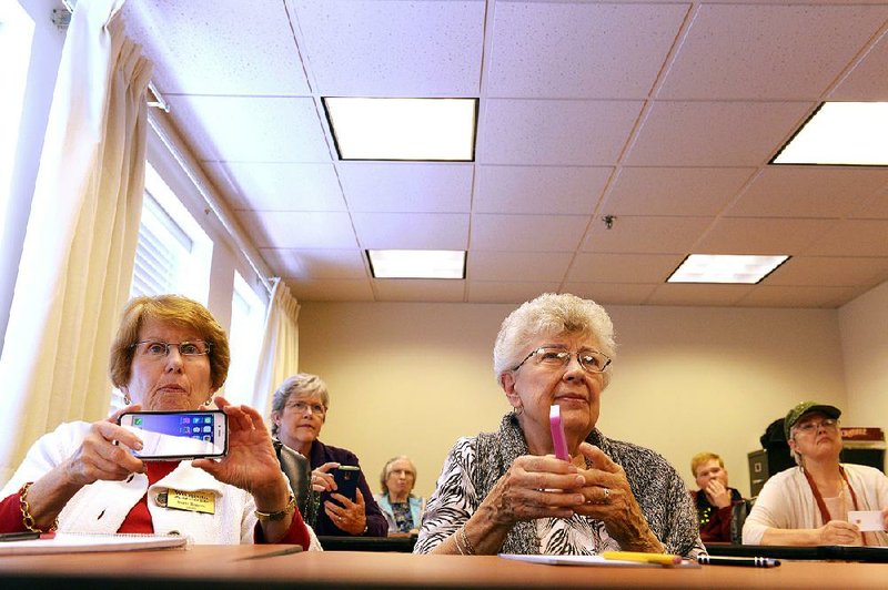 Residents at a Virginia retirement community are learning smartphones are for more than just games. They can also be used to take selfies and answer questions via Siri.