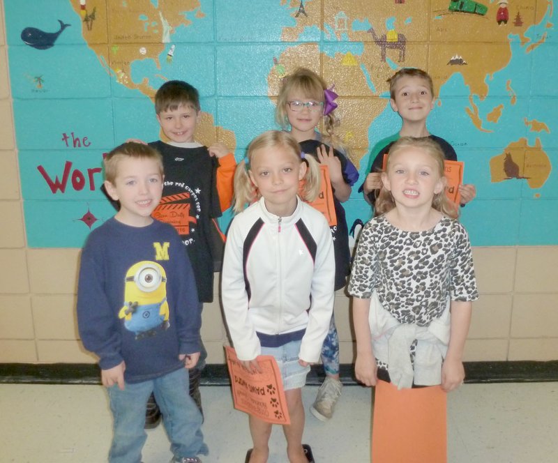 Submitted Photo PAWS (&quot;Pawsitive&quot; and Wise Student) winners were recognized and given certificates and t-shirts at the March Rise and Shine assembly. PAWS award winners for this month are Ronan Soule, of Gravette, front row, left; Rebekah Schmidt, of Gravette; Saydee Davis, of Gravette; Braiden Sales, of Sulphur Springs, back row, left; Sulli Schaffer, of Bella Vista, and John Gregory of Gravette.