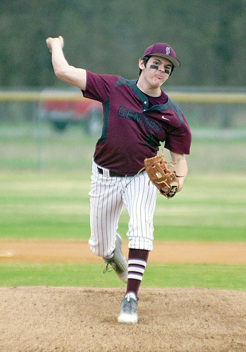 Photo by Randy Moll Wyatt Clark, Gentry senior, throws a pitch during a Saturday game in Gentry against Oaks-Mission.