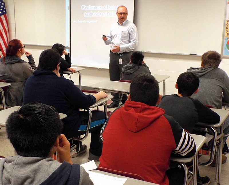 Photo by Randy Moll Melvin Leroy, of McKee Foods, spoke to students about the rewards and challenges of a truck driving career at the Career Day held at Gentry High School on Thursday, March 10, 2016.