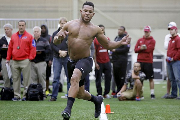 Former Arkansas running back Jonathan Williams goes through a workout Wednesday, March 16, 2016, at the Walker Indoor Pavilion in Fayetteville. 