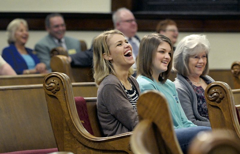 Whitney Mann (from left), daughter Nevlyn Mann and mother Debbie Weaver of Rogers have a laugh Sunday during the Laughter Sunday service at First United Methodist Church in Rogers. The church plans the service annually “as a respite from the gloom and foreboding of Lent,” said the Rev. David Bentley, senior pastor.