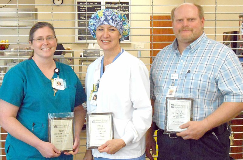 Photo Submitted Siloam Springs Regional Hospital recently announced its employees of the year for 2015. The employee of the year was Sheri Decker, RN, (center). Decker works in the hospital&#x2019;s surgery department. Clinical director of the year was Alina Grammer, laboratory director; and the non-clinical director of the year was Wayne Bollman, director of plant operations.