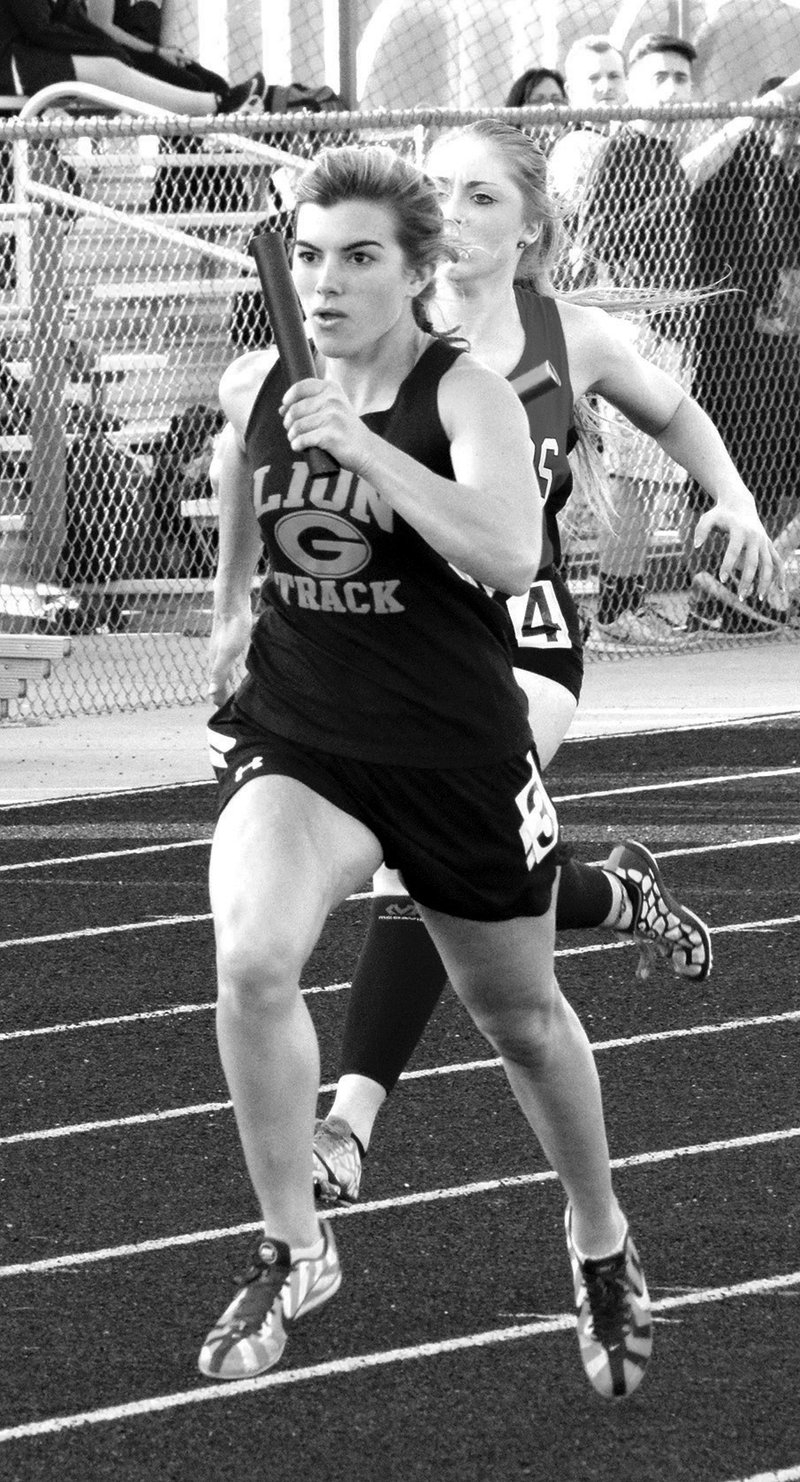 Photo by Mike Eckels Jordan Jeter, of Gravette, competes in a race at the Tiger Relays at Bentonville High School. She finished second in both the 100- and 200-meter events.