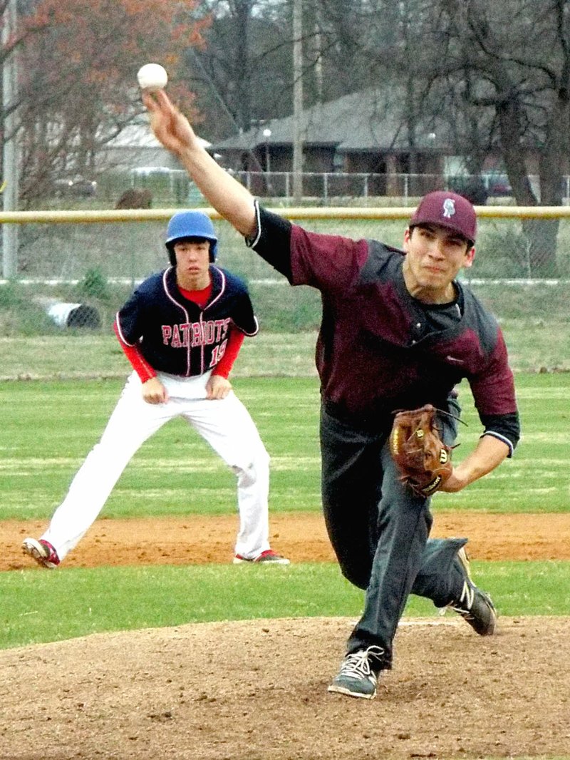 Photo by randy Moll With a Providence Academy runner on second, CJ Taylor lets go of a pitch for Gentry in play on Friday at Gentry High School.