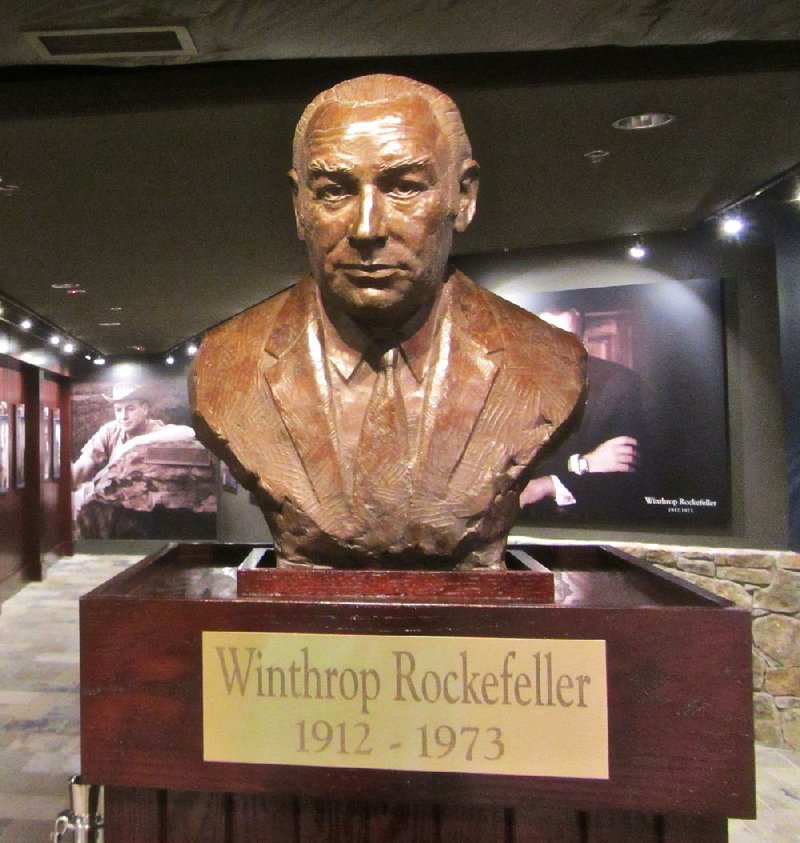 A bust of Winthrop Rockefeller, elected governor of Arkansas in 1966 and 1968, greets visitors to the Winthrop Rockefeller Institute on Petit Jean Mountain. 