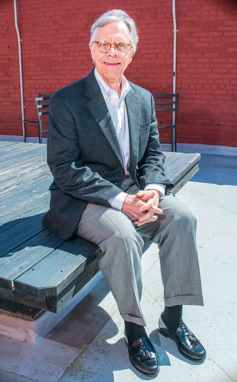 Jerry Adams sits on the rooftop of the Halter Building in downtown Conway. The space is right outside the office of the nonprofit Arkansas Research Alliance, of which he is CEO and president. Adams, who grew up in Kirkwood, Mo., and graduated from Sewanee: The University of the South in Tennessee, came to Conway to work for what became Acxiom and has worked to improve the state’s business and education climates.