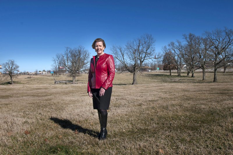 Trisha Montague, senior vice president of regional services for Arkansas Children’s Hospital stands on the construction site for the new hospital campus in Springdale.