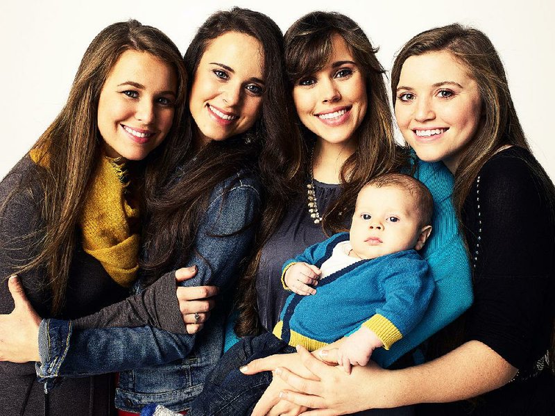 Jill and Jessa: Counting On features the lives of the older Duggar sisters, including (from left) Jana, Jinger, Jessa Duggar Seewald (holding her son Spurgeon) and Joy-Anna.