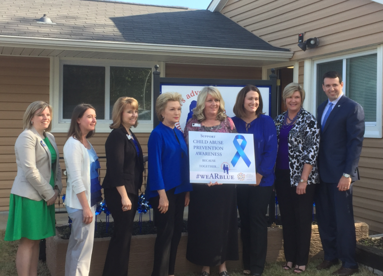 Arkansas First Lady Susan Hutchinson (fourth from the left) met with workers and supporters of the Children's Protection Center in North Little Rock Tuesday. 