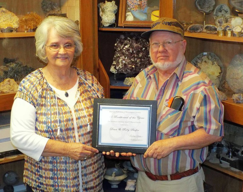 Photo by Randy Moll Ruby and Dean Shafer of Gentry show their 2015 Rockhound of the Year award won from the American Federation of Mineralogical Societies. The Couple was nominated for the award through the Northwest Arkansas Gem &amp; Mineral Society in Siloam Springs, the Rocky Mountain Federation of Mineralogical Societies (the district in which the Northwest Arkansas group is a member). The Shafers are pictured at their Main Street business in Gentry, Arkhoma Hobbies &amp; Lapidary.