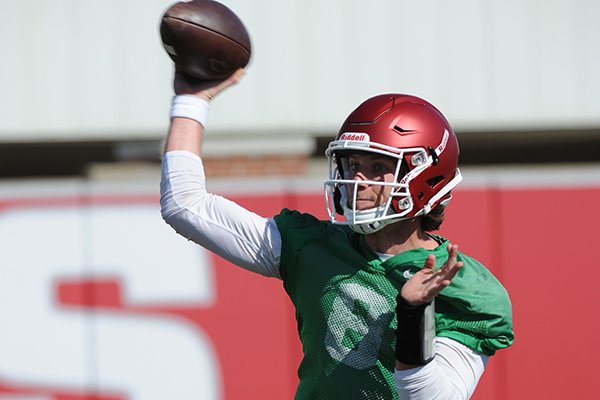Arkansas quarterback Austin Allen participates in a footwork drill Tuesday, March 29, 2016, during practice at the university's practice field on campus in Fayetteville.