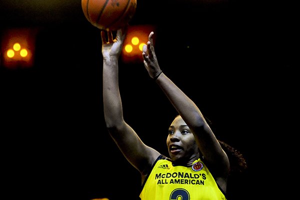 Aaliyah Wilson, from Muskogee, Oklahoma, competes in the girls three point contest during the McDonald's All-American Jam Fest, Monday, March 28, 2016, in Chicago. (AP Photo/Matt Marton)
