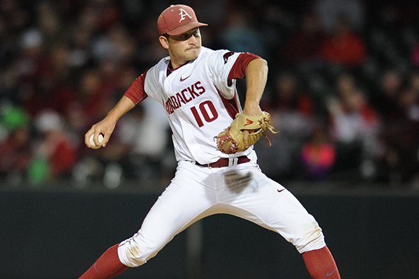 Arkansas reliever Josh Alberius delivers a pitch against Auburn Friday, March 25, 2016, during the ninth inning at Baum Stadium in Fayetteville.