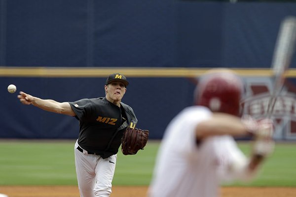Missouri's Tanner Houck (11) pitches against Alabama during the first inning of a game at the Southeastern Conference baseball tournament at the Hoover Met, Thursday, May 21, 2015, in Hoover, Ala. (AP Photo/Butch Dill)