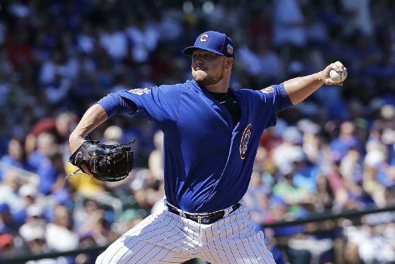 Left-hander Jon Lester is one of the key cogs for the Chicago Cubs who were joined in the offseason by free agents Jason Heyward, John Lackey and Ben Zobrist. 