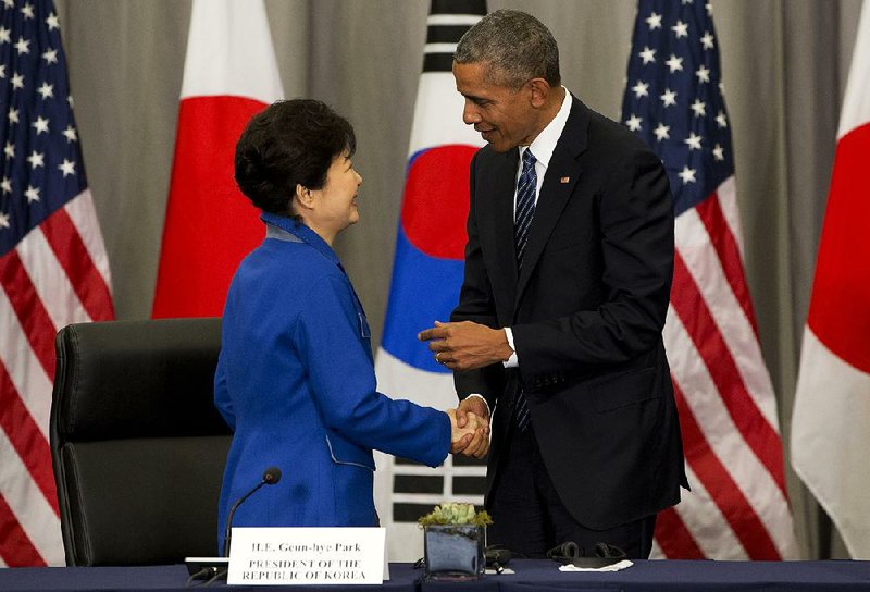 President Barack Obama talks Thursday with South Korean President Park Geun-hye during the summit on nuclear terrorism Obama is hosting in Washington.