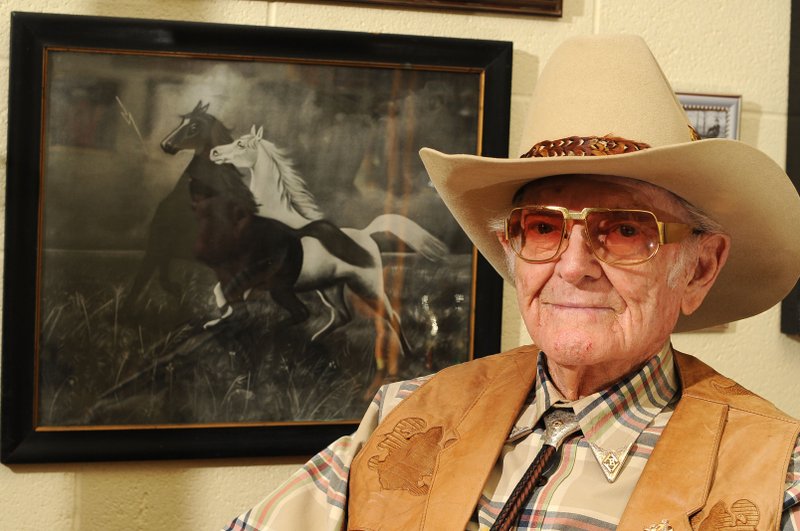 Joseph Sanford “Sandy” Boone is shown in 2012 at his office on Spring Street in downtown Springdale. An early city father and lover of horses, Boone died Thursday at 93.