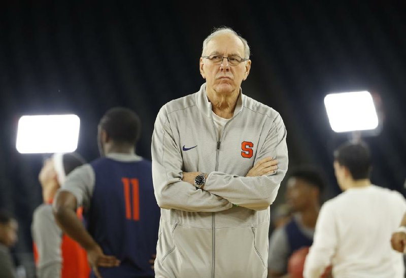 FILE — Syracuse head coach Jim Boeheim watches during a practice session for the NCAA Final Four college basketball tournament Friday, April 1, 2016, in Houston. (AP Photo/David J. Phillip)