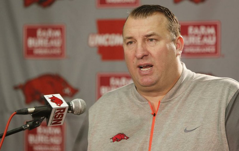 NWA Democrat-Gazette/DAVID GOTTSCHALK  University of Arkansas head football coach Bret Bielema speaks Monday, February 29, 2016, before introducing assistant coaches Paul Rhoads and Reggie Mitchell at the Fred W. Smith Center on the campus in Fayetteville.
