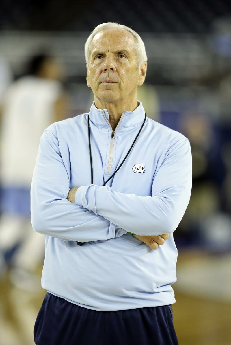 North Carolina head coach Roy Williams watches during a practice session for the NCAA Final Four college basketball tournament Friday, April 1, 2016, in Houston. 