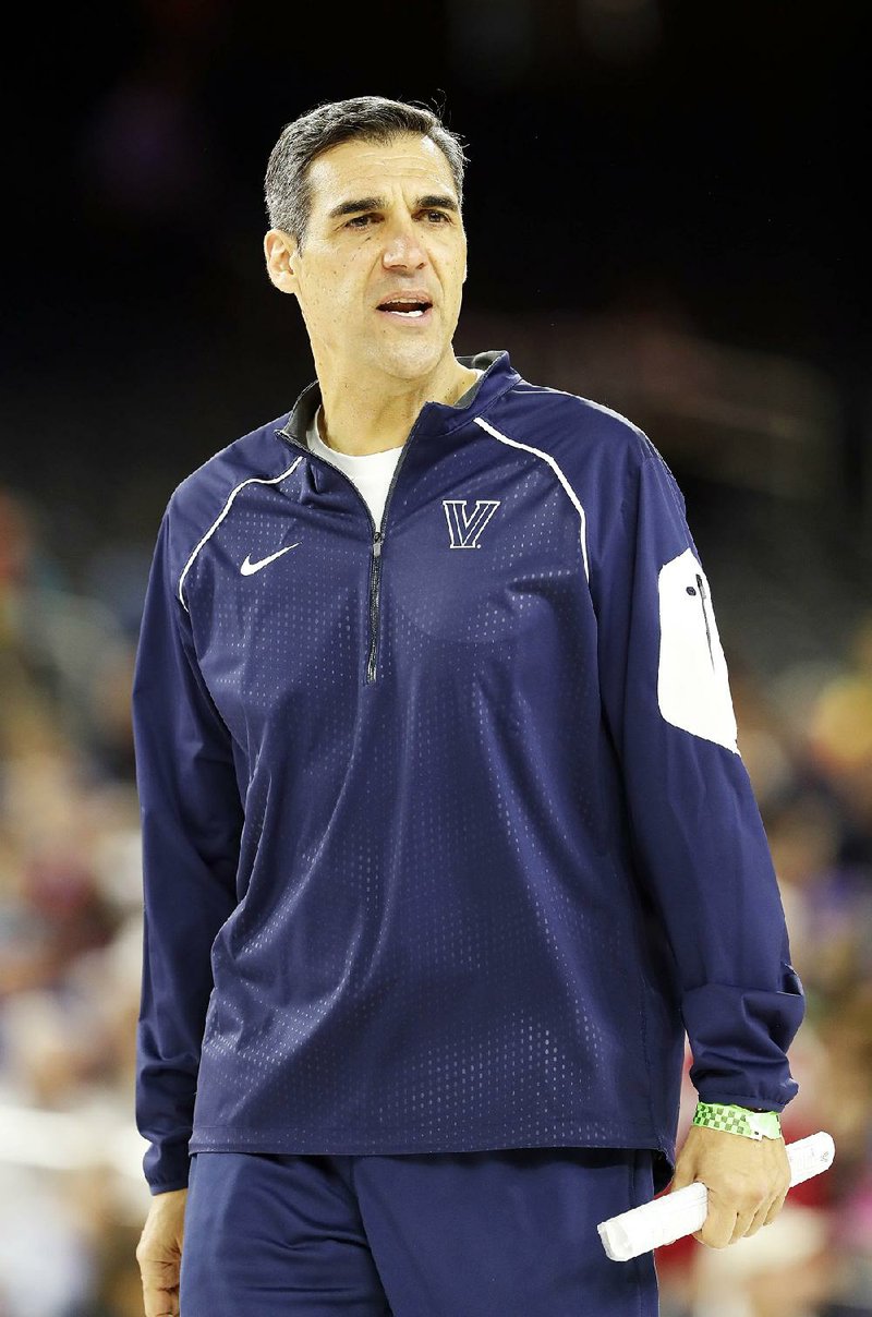 Villanova head coach Jay Wright watches a drill during a practice session for the NCAA Final Four college basketball tournament Friday, April 1, 2016, in Houston. 