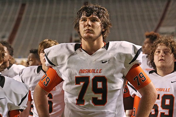 Nashville offensive lineman Kirby Adcock waits as he is announced MVP of the class 4A state championship game on Saturday, Dec. 12, 2015, at War Memorial Stadium in Little Rock.