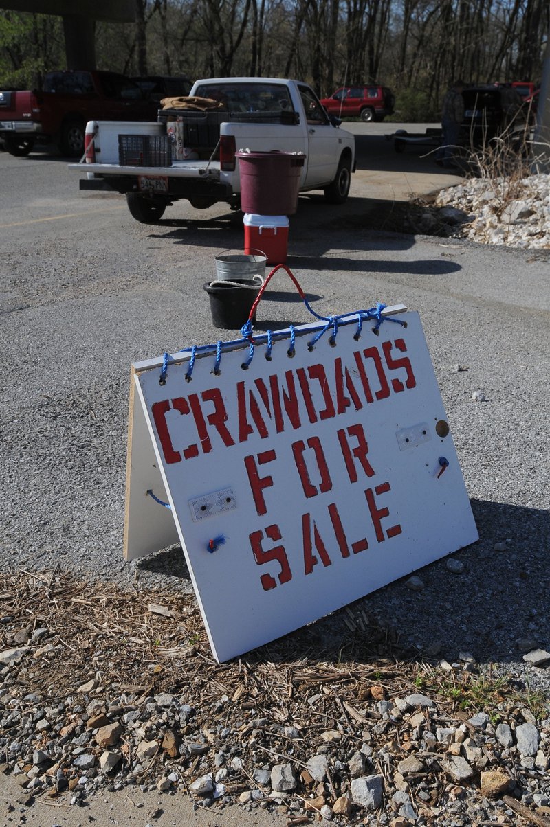 The Crawdad Man has been selling crawdads at the Arkansas 45 bridge access to the White River for 40 years.