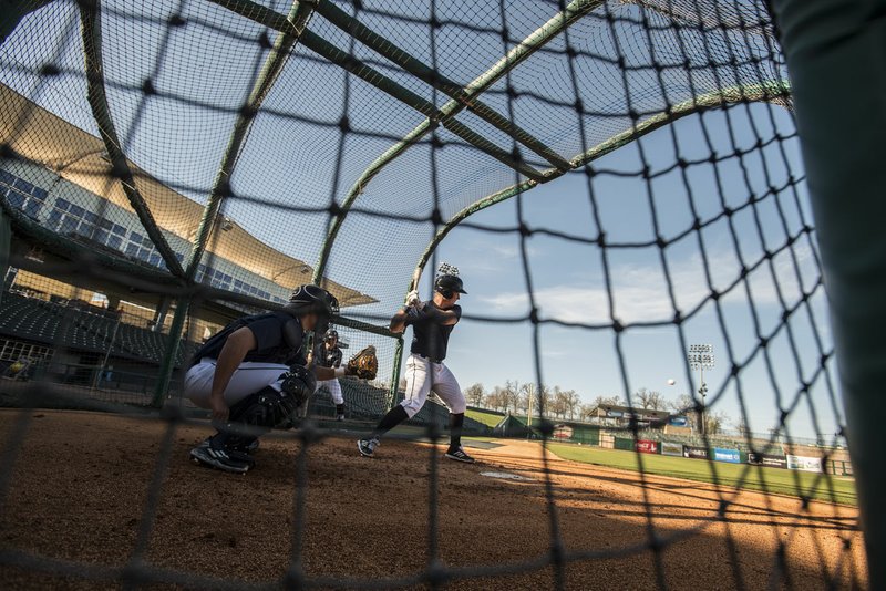 Third baseman Hunter Dozier (24) of the Northwest Arkansas Naturals during batting practice Monday, April 4, 2016 at Arvest Ballpark in Springdale.