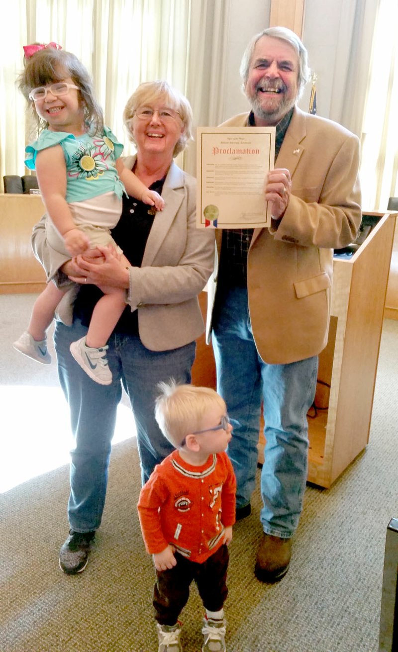 Photo submitted Mayor John Turner issued a proclamation on Thursday declaring April 10 through 16 to be Arkansas Children&#8217;s Week in Siloam Springs. Mary Nolan, director of the Siloam Springs Children&#8217;s Center, is pictured with Turner, along with several young students. Siloam Springs School Readiness Committee, comprised of local education and child care professionals, will be celebrating Arkansas Children&#8217;s Week by assisting Northside Elementary School in presenting &quot;How the Camel Got His Hump,&quot; on Thursday April 14 at the Siloam Springs Middle School Fine Arts Building. The presentation is free and the public is invited.