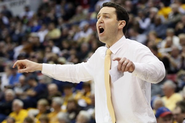 In this March 7, 2016, file photo, Valparaiso head coach Bryce Drew shouts instructions to his team during an NCAA college basketball game against Green Bay in the Horizon League tournament in Detroit. Vanderbilt has lured Bryce Drew away from his alma mater at Valparaiso to coach the Commodores men’s basketball team.The Commodores announced the hiring Wednesday, April 6, 2016. (AP Photo/Duane Burleson, File)