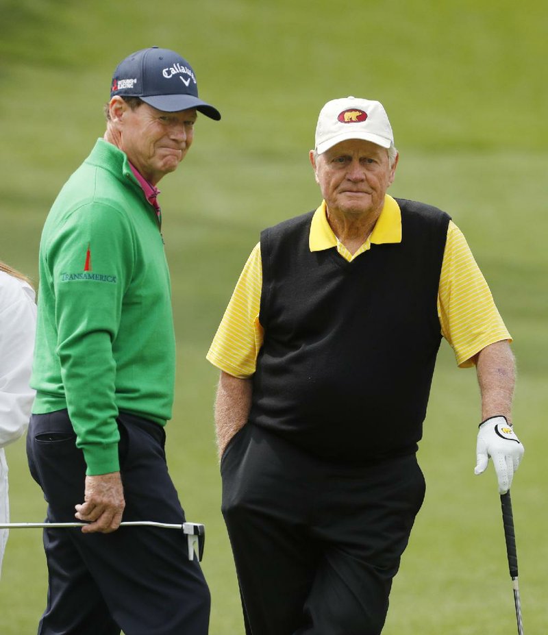 Tom Watson, left, talks to Jack Nicklaus on the second hole during the par three competition at the Masters golf tournament Wednesday, April 6, 2016, in Augusta, Ga. 
