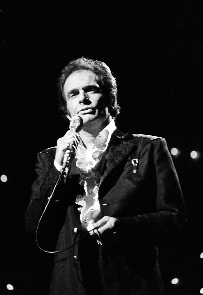 Country music singer Merle Haggard, shown performing Oct. 8, 1977, at the Country Music Association Awards in Nashville, Tenn., died on his birthday Wednesday after a months-long battle with pneumonia. He was 79. 