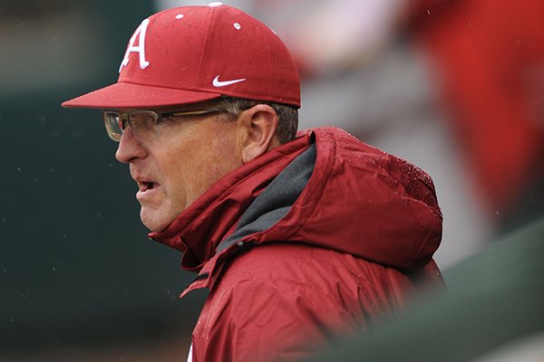 Arkansas coach Dave Van Horn watches from the dugout against Mississippi Valley State Tuesday, Feb. 23, 2016, during the first inning at Baum Stadium in Fayetteville. 