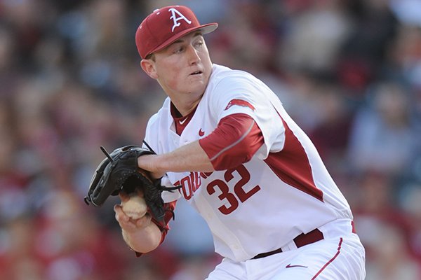 Zach Jackson of Arkansas delivers against Central Michigan Friday, Feb. 19, 2016, during the eighth inning at Baum Stadium in Fayetteville.