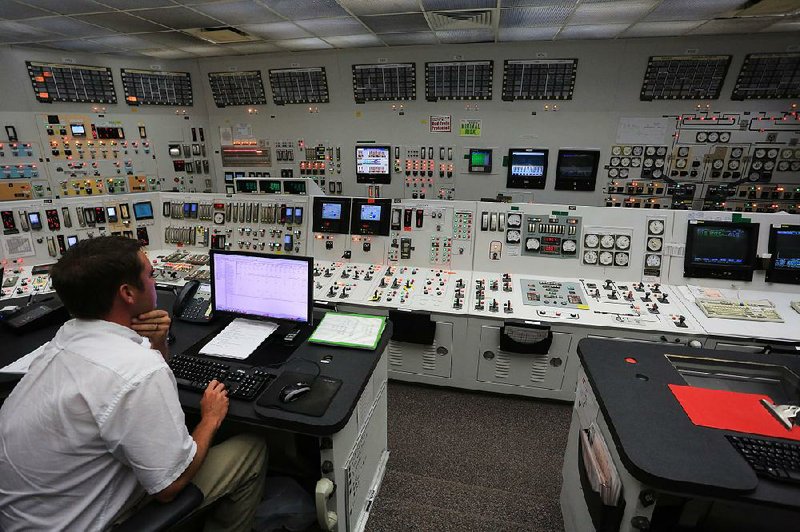 An employee keeps watch in the control room at Arkansas Nuclear One near Russellville in July.