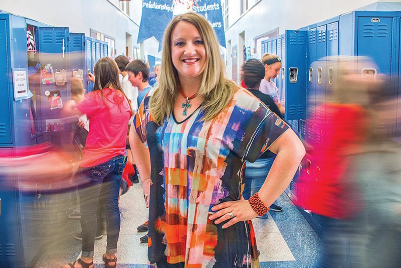 Greenbrier Middle School Principal Kelli Martin stands in the hallway as students go to class. She received the Arkansas Association of Elementary School Principals Award for Service Above and Beyond. “My major focus, day in and day out, is developing that productive and positive and collaborative culture,” she said. Former Wooster Elementary School Principal Lenett Trasher said Martin’s attributes include “her love for kids, her love and support for teachers — she’s just outstanding all the way around.”