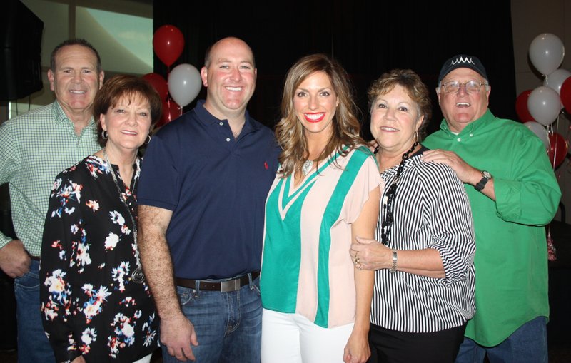 Jim and Rhonda Woodruff (from left), Patrick and Meredith Woodruff and Peggy and Buddy Jordan welcome Miller McNeil Woodruff Foundation supporters to the fifth annual Cupcakes and Cocktails on April 1 at the Fayetteville Town Center.