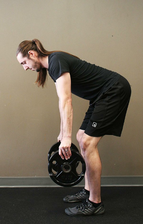 Plate Pinch Row strengthens grip, arms, back, core The Arkansas