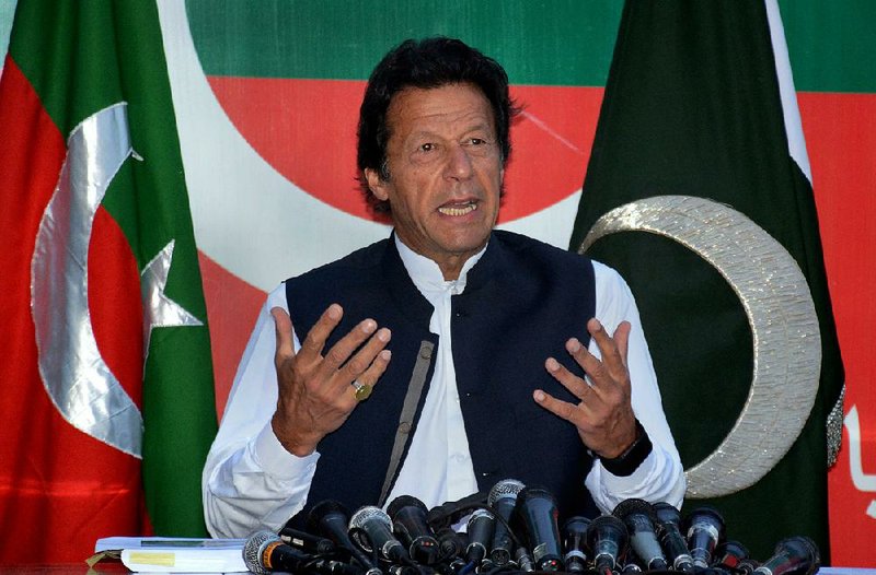 Pakistan opposition leader Imran Khan speaks Sunday in Islamabad. Khan called on Pakistan Prime Minister Nawaz Sharif to resign, saying documents leaked from a Panama-based law firm indicate his sons own several offshore companies.