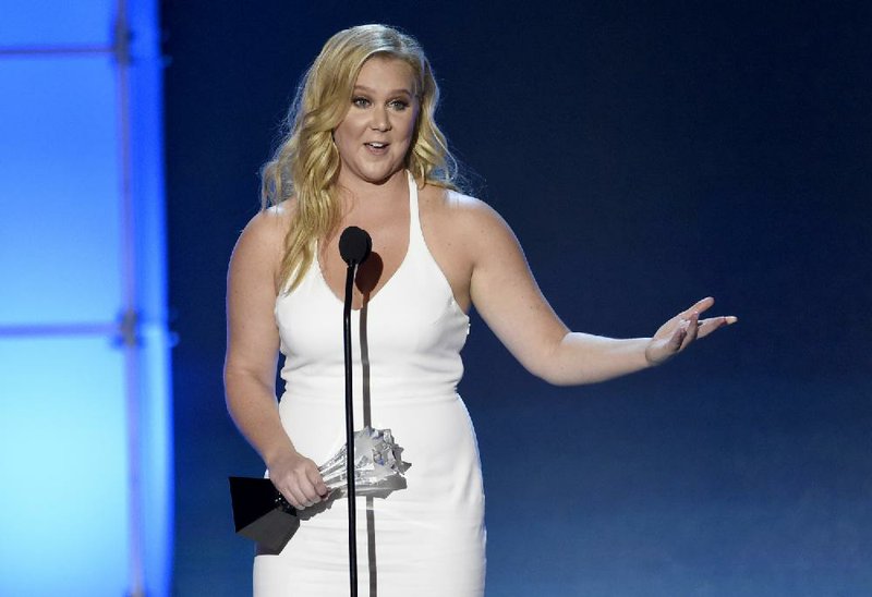 In this Jan. 17, 2016 file photo, Amy Schumer accepts the Critics’ Choice MVP award at the 21st annual Critics' Choice Awards in Santa Monica, Calif.