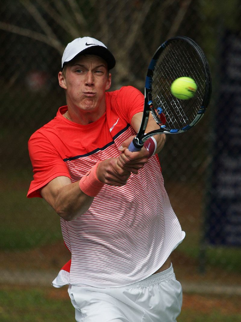 Jan Choinski of Germany backhands a return in a three-set loss to Christian Lindell of Sweden in the round of 16 of the Bolo Bash at Rebsamen Tennis Center in Little Rock on Thursday. 