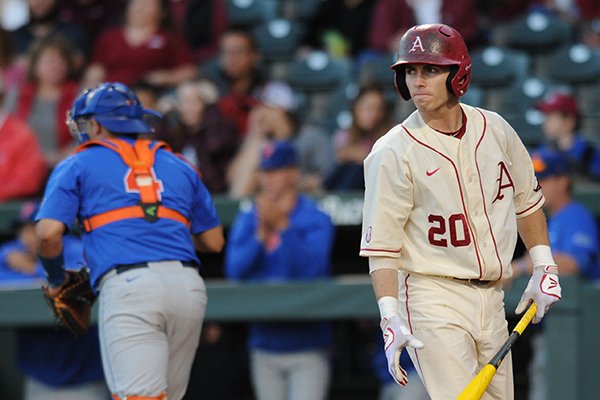 Arkansas third baseman Carson Shaddy reacts after striking out with Jake Arledge at third against Florida Friday, April 15, 2016, during the third inning at Baum Stadium in Fayetteville. 