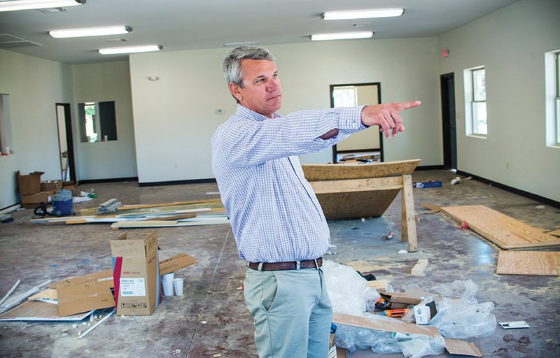 Dean Castle, director of the Phoenix Recovery Center in Conway, gives a tour of the 5,000-square-foot drug-and-alcohol treatment center on Jersey Street that will be completed within days. It will be the first licensed drug-and-alcohol treatment facility in Faulkner County, and the program is licensed for 38 residential beds in the adjacent housing. Outpatient treatment will be offered as well. The facility includes a kitchen, laundry services, offices and a large meeting room that can be divided.