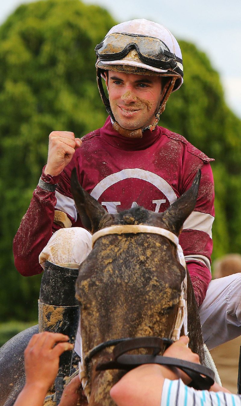 Jockey Florent Geroux celebrates aboard Counterforce after winning the Bachelor Stakes on Friday at Oaklawn Park.

