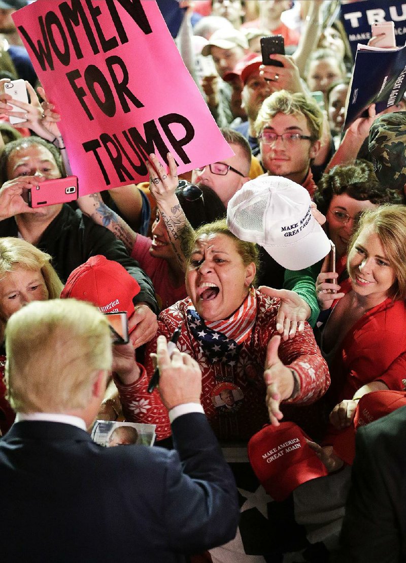 Republican presidential candidate Donald Trump greets supporters at a campaign event Sunday in Poughkeepsie, N.Y.