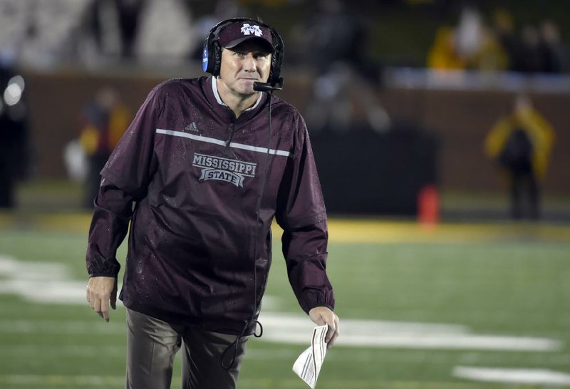 Mississippi State head coach Dan Mullen watches from the sidelines during the first half of an NCAA college football game against Missouri on Thursday, Nov. 5, 2015, in Columbia, Mo. (AP Photo/L.G Patterson) 